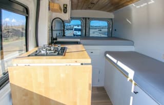 Luxury '19 Ford Transit w/ bathtub, roof deck+more
