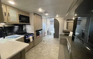 COZY NEW Forrest River Travel Trailer