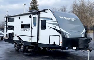 "Run Around Sue" 2021 Keystone RV Passport 221BH