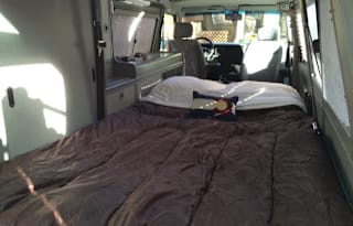 VW Eurovan: sleeps 4 drives like minivan + 22 MPG