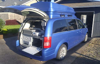 Tiny Van Camper with Full Kitchen and Upstairs Pop-Up Tent