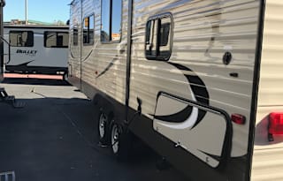 2018 Keystone Hideout, 26' long plus 3' hitch. Total: 29 Feet long.