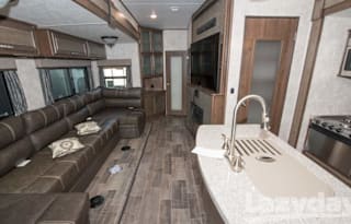 Brand new 5th wheel with large bunkhouse and 1 1/2 baths!
