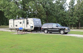 2018 Keystone Hideout, 26' long plus 3' hitch. Total: 29 Feet long.