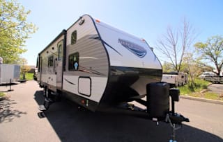RV Trailer Delivered to Your Reserved Camping site