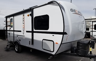 This trailer is Ultra lite and towable by almost any SUV or small pickup truck. Sleeps 4 and only weights 3,000lbs. Has a small slide out, U shaped dinette. Fully self contained. All the basic RV needs. Includes a outside bbq power awning and more...
