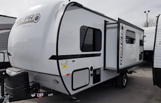 This trailer is Ultra lite and towable by almost any SUV or small pickup truck. Sleeps 4 and only weights 3,000lbs. Has a small slide out, U shaped dinette. Fully self contained. All the basic RV needs. Includes a outside bbq power awning and more...