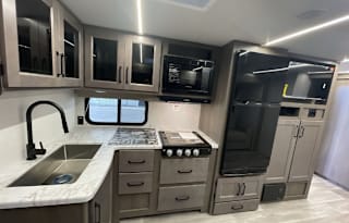 His and Her BathRooms--2024 Grand Design 321BH