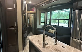 42’ Luxury Toyhauler with rare Side Patio