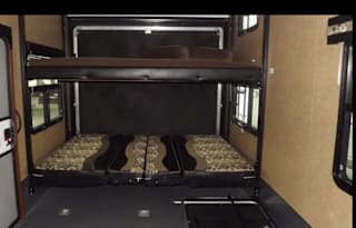 Luxurious Toy-hauler with 3 slides and 14' garage.