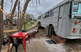 Cozy school bus on the river,  pet friendly,