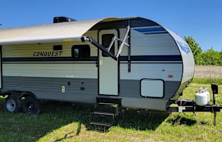 Festival and Pet Friendly Slide out Camper