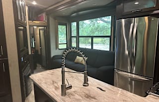 42’ Luxury Toyhauler with rare Side Patio