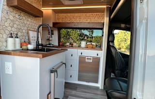 The Elite Explorer: Custom Luxury 4x4 Sprinter Van