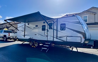 The Farmhouse travel trailer.