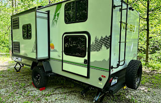 Cozy Home on Wheels: Lightweight Travel Trailer