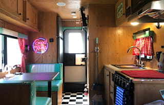 Retro style glamping. Time travel in a modern RV