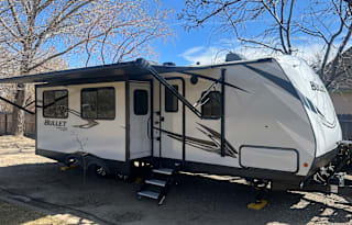 "Happy Camper" Family Travel Trailer