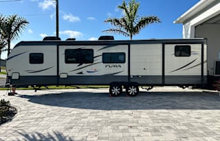 “Our Cozy Happy Place Travel Trailer Rental Puma “