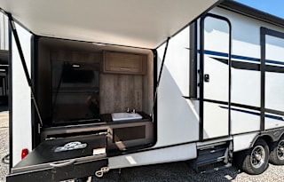 #24_Trailer w/ king, bed 4 bunks & outside kitchen