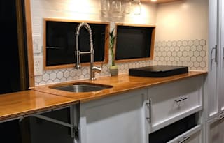 CONVERTED SCHOOL BUS TINY HOME ON WHEELS SEATS 7!