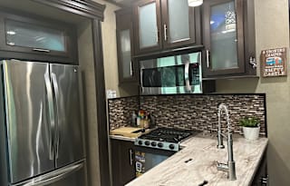 42’ Luxury Toyhauler with rare Side Patio