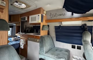 Cozy Roadtrek Van for your next adventure!