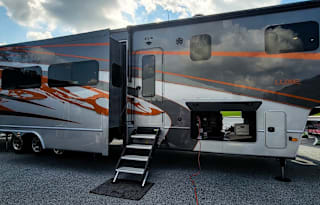 2022 RV Factory Luxe Toy Hauler with Tow Vehicle