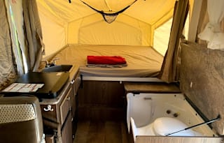 Camping with luxuries! EZ to tow popup!