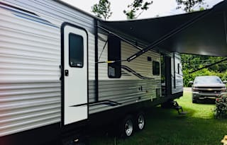 Aaron and Kim's Luxury Travel Trailer 38FT Sleeps 6 Comfortably