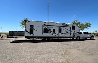 2020 Genesis 5th Wheel Toyhauler with deck patio