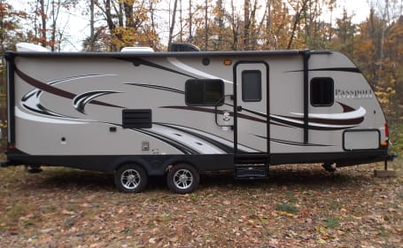 2015 Keystone Passport travel trailer sleeps 6 with all the comforts of home, fun for the whole family.