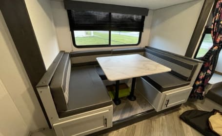 Here are inside of RVs at 2023 RV Show in Milwaukee's Wisconsin Center