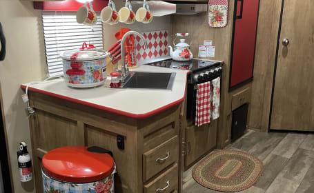 Step back in time in this charming vintage camper!