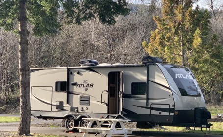 WE HAUL!  2019 Dutchmen Atlas with outdoor kitchen, lots of amenities & fully stocked!