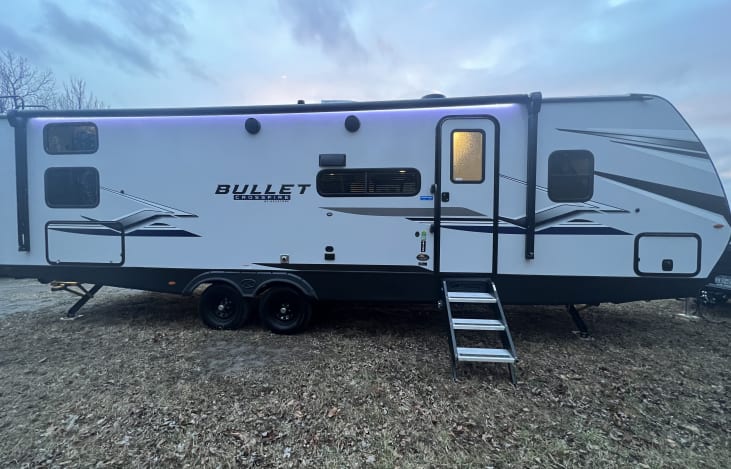 Awning with LED lights for your comfort. 
Left hand storage door is mini fridge and blackstone griddle.