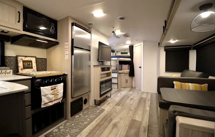 Experience "Harmony" with our 2024 Heartland Sundance U-L 278BH located near Table Rock Lake near Branson Missouri and Lake Of The Ozarks. Thank you from us at Stone Mountain RV & Camper Rentals!
