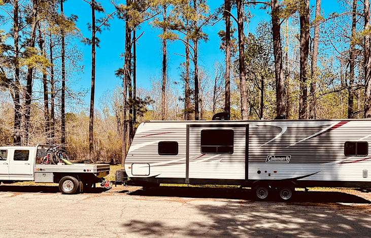 West side of the Toy Hauler.  This photo was taken at a park on San Rayburn Lake.