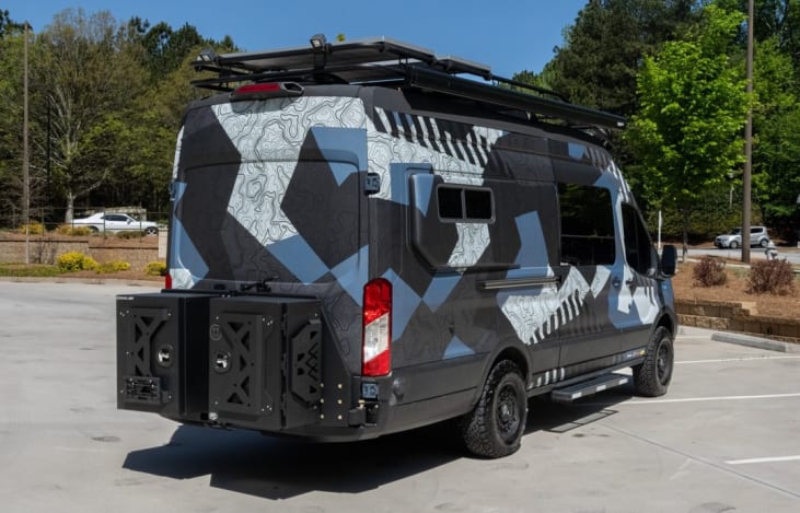 Rear of van highlighting two oversized, lockable storage boxes for your additional gear.
