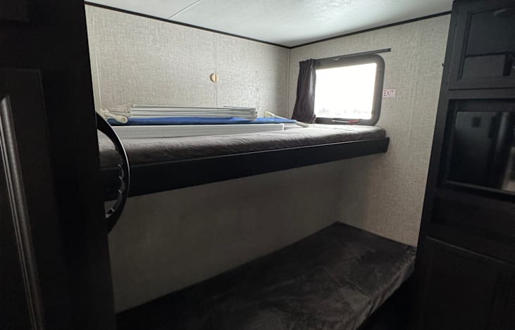 Bunk House- comes with one portal bed rail if needed.