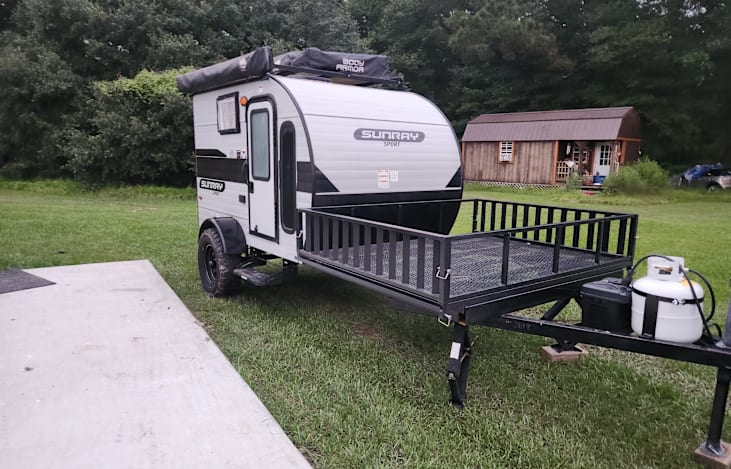 Side rails come off to make ramp for four wheeler Etc