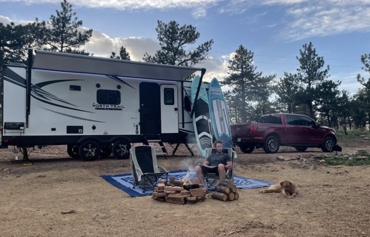 Comes equipped with outdoor mat, and optional paddle board/ camp chairs. Cute puppy and truck not included, but feel free to bring your own :)