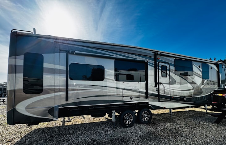 This RV has 3 slide outs and 2 awnings.