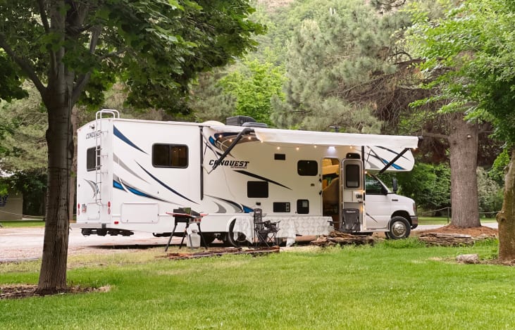 Outdoor string lighting, 3 burner camping stove with 2 burner griddle top and propane tank, 8 camp chairs, 2 tables, mat and outdoor games included upon request to make your outdoor space amazing.