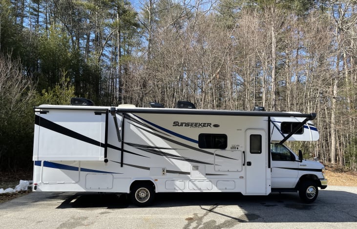 Lighted power awning with built in speakers!