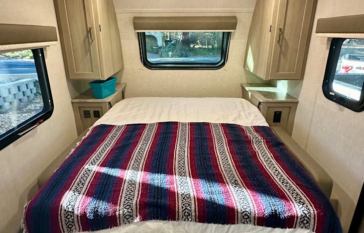 Comfortable queen-size murphy bed that folds down from wall.