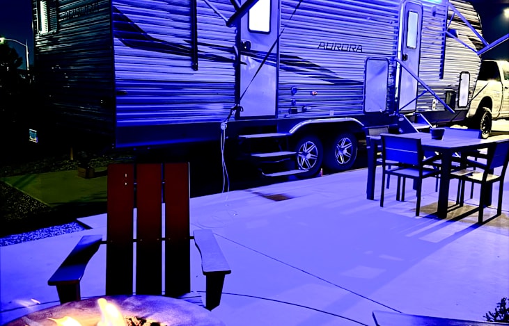 Awning with LED lighting and outside speakers for your entertainment.