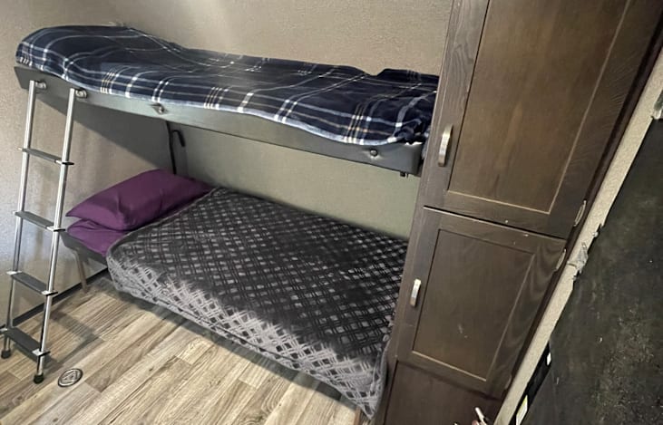 Twin bunks in garage area.