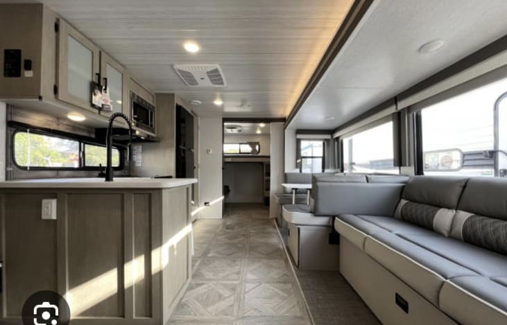 Comfy couch pulls out into bed as well as dinette.