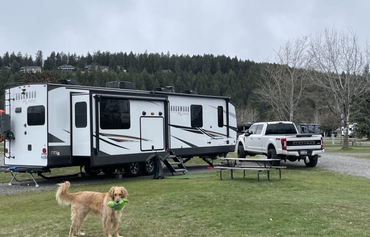 This large travel trailer is sure to impress. Two awnings and outdoor refrigerator and stereo speakers for convenience.